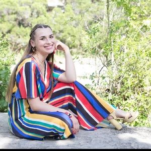 Women’s colorful jumpsuit, size small, brand is Flying Tomato